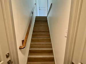 Stairs with baseboards Leading to rental opportunity