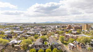 Drone / aerial view featuring a mountain view and a residential view