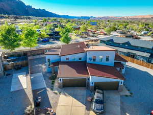 Drone / aerial view with a mountain view and a residential view