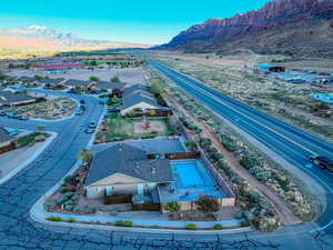 Birds eye view of community pool with a mountain view