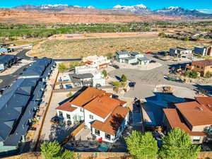 Drone / aerial view featuring a residential view and a mountain view