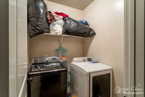 Clothes washing area with washing machine and dryer and laundry area
