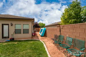 View of yard featuring a fenced backyard