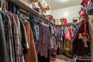 Spacious closet featuring carpet floors