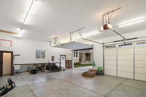 Garage featuring a garage door opener