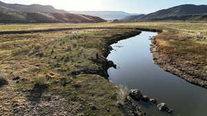 View of mountain background with a nearby body of water