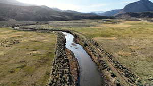 View of mountain backdrop with a large body of water
