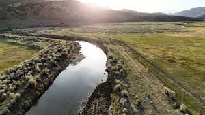 View of rural area featuring a water and mountain view