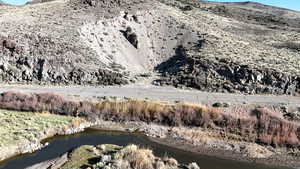 Mountain view with a nearby body of water