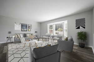 Spacious and open great room with fresh neutral paint and bay window