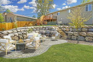 You will love the terraced and private backyard with a paver patio and firepit.
