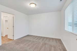 Awesome primary bedroom with ensuite bath and walk in closet!