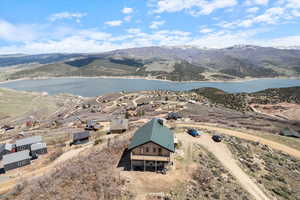 Bird's eye view with a water and mountain view