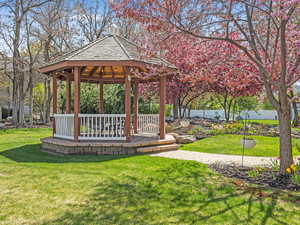 View of community featuring a yard and a gazebo