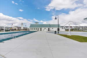 View of swimming pool with a residential view
