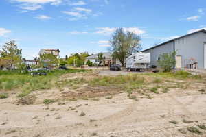 View of yard featuring a garage