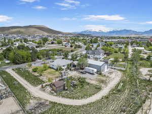Birds eye view of property featuring a residential view and a mountain view