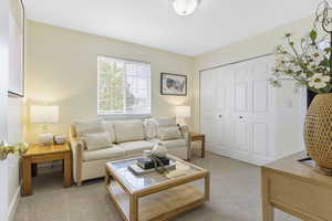 Living room with light colored carpet