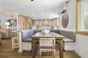 Dining area featuring wood finished floors, recessed lighting, and breakfast area