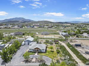 Drone / aerial view featuring a residential view and a mountain view