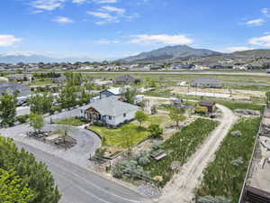 Birds eye view of property featuring a residential view and a mountain view