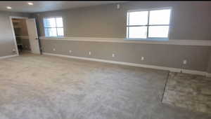 Unfurnished bedroom with baseboards, recessed lighting, and carpet flooring