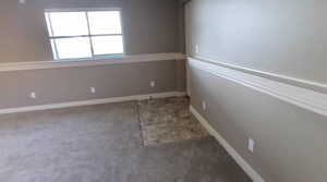 Empty room with baseboards