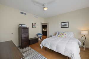 Bedroom featuring ceiling fan, light wood-style floors