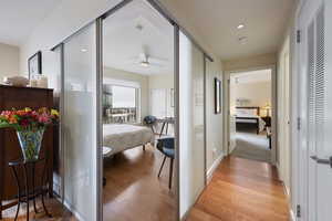 Hallway featuring recessed lighting and light wood finished floors