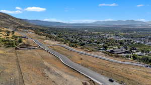 Aerial view of residential area featuring a mountain backdrop