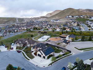 Drone / aerial view featuring a residential view and a mountain view