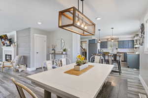Dining room with baseboards, light wood-style floors, visible vents, and recessed lighting