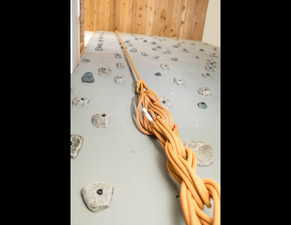 Custom climbing wall inside of front door way !