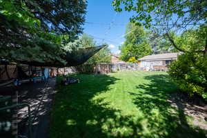 View of yard featuring a fenced backyard