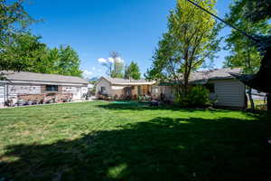 View of yard featuring fence