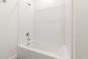 Bathroom featuring  shower combination