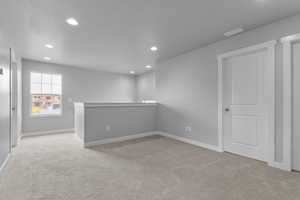 Interior space featuring visible vents, baseboards, and recessed lighting