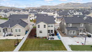Drone / aerial view with a mountain view and a residential view