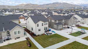 Drone / aerial view featuring a residential view and a mountain view