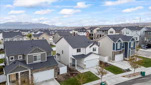 Drone / aerial view featuring a mountain view and a residential view