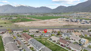 Drone / aerial view with a mountain view and a residential view