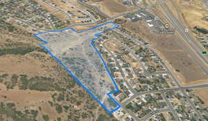 Aerial overview of property's location featuring property boundaries highlighted