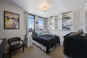 Bedroom featuring carpet