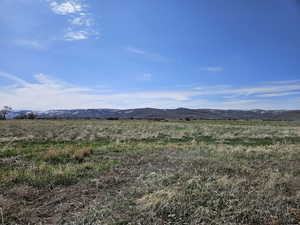 Property view of mountains featuring a rural view
