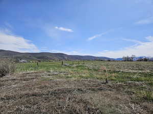 View of mountain feature with a rural view