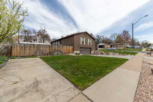 west side of the home, featuring the RV parking.