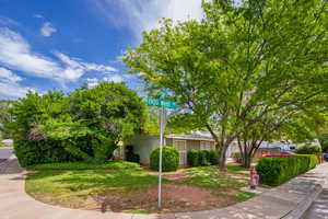 View of home's exterior with a yard