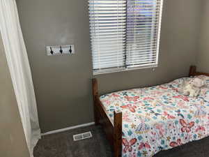 Bedroom # 3 featuring carpet flooring and visible vents