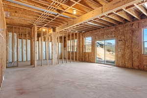 Framed and insulated  for large gathering area with walkout to potential patio and yard space