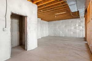 Lower level framed for kitchen, dining area, wine/cold storage